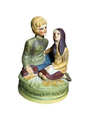 Vintage 1971- “Love Story” movie Ceramic Couple Sculpture Rotating Music Box